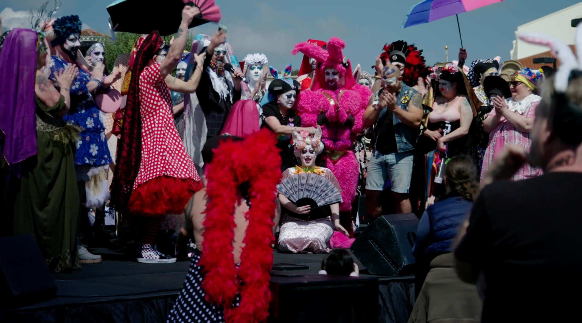 Sisters of Perpetual Indulgence gathered for an outdoor ceremony